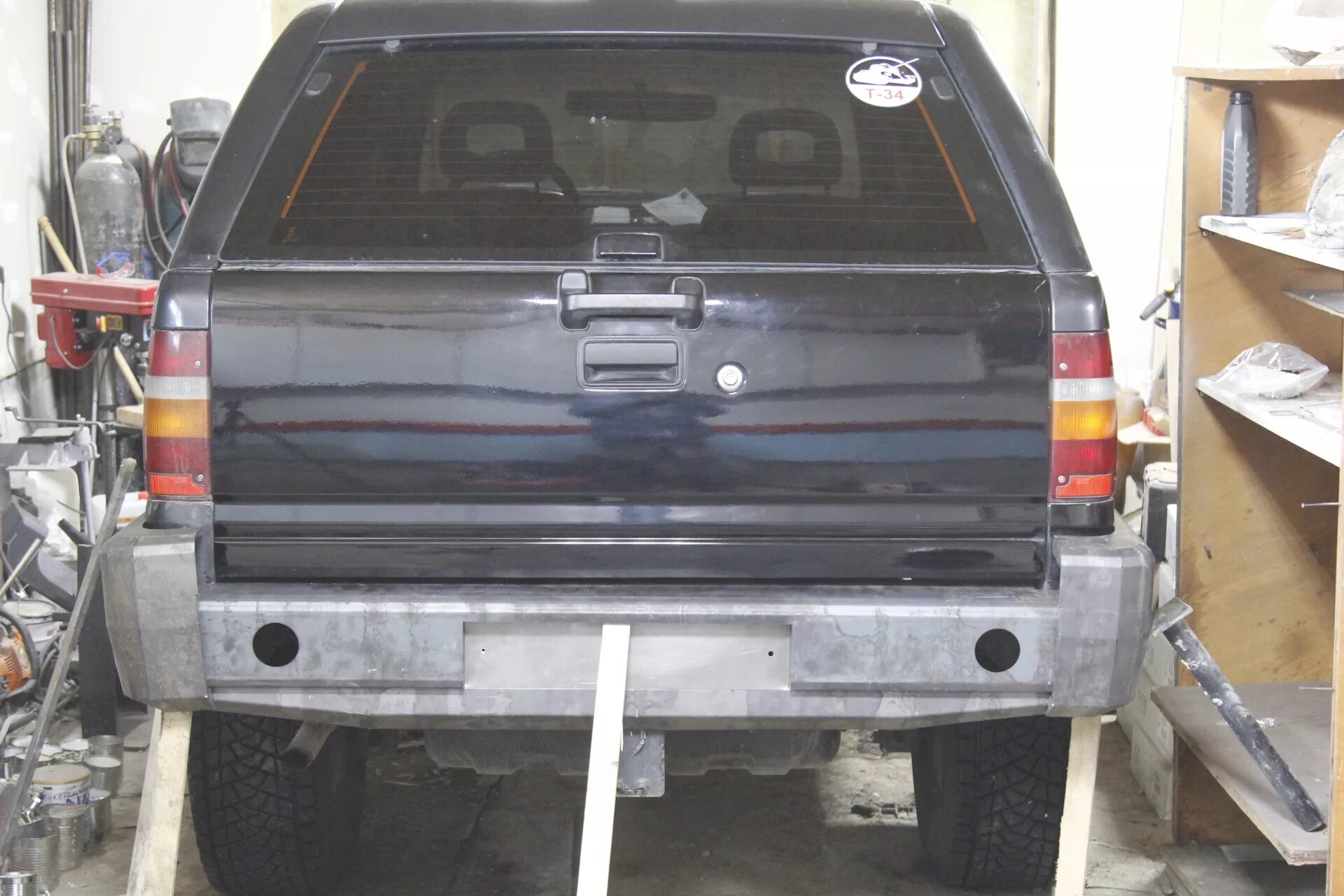 Бампер фронтера а задний. Клыки заднего бампера на опель фронтера. Frontera b сзади. Задний бампер опель фронтера а. Силовой бампер опель фронтера а.