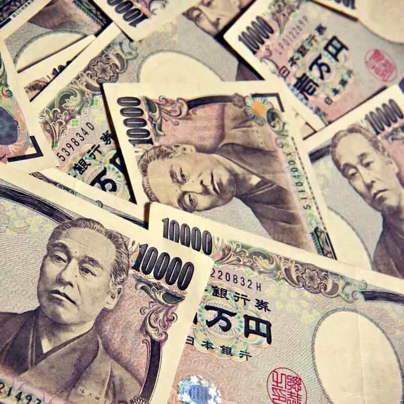 Купюры йен. Японская йена. Японские деньги. Изображение японской йены. Бумажные йены японские.