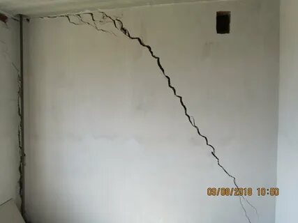 Трещина на стене в квартире