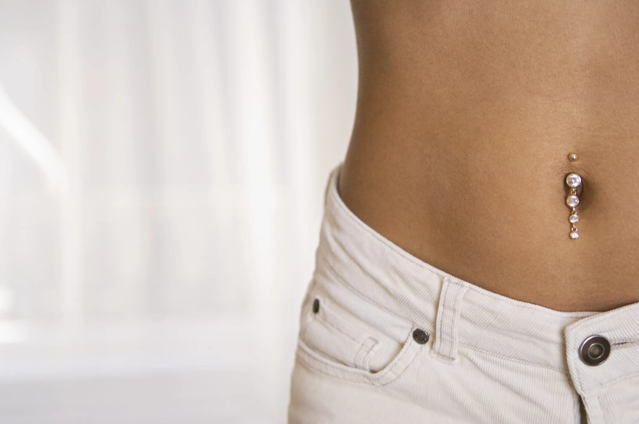 пирсинг пупка. нижние пупки. нижние пупки. пирсинг пупка. множественный пирсинг пупка.