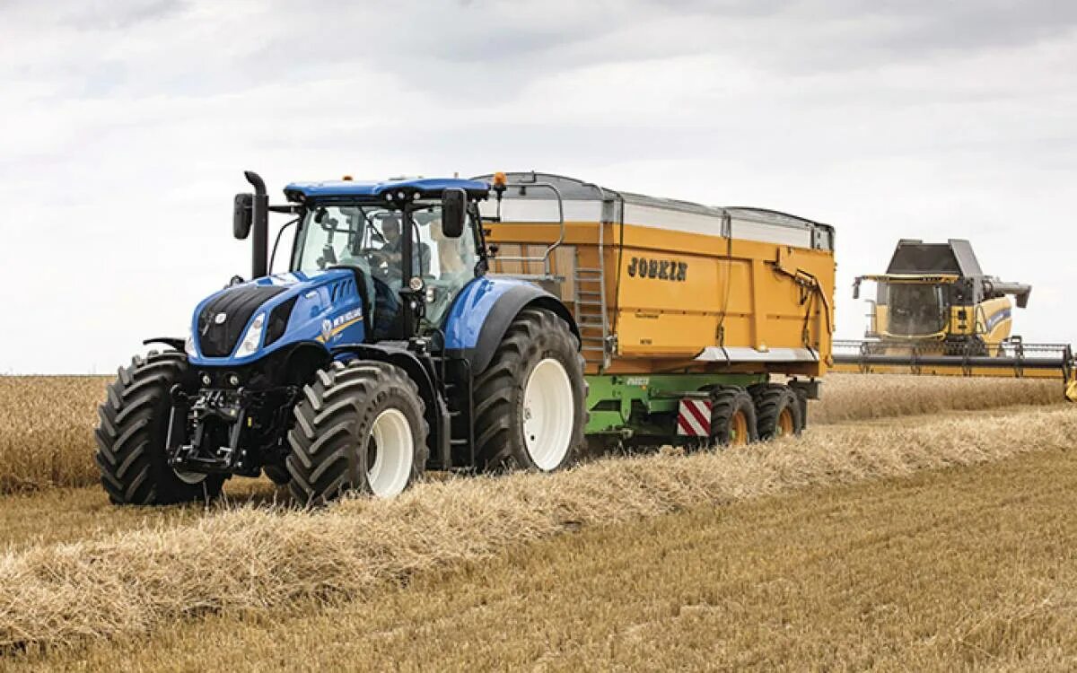 New holland t. Нью Холланд трактор t 7. Трактор New Holland t8040. Трактор New Holland t7060. Трактор New Holland t7.270.