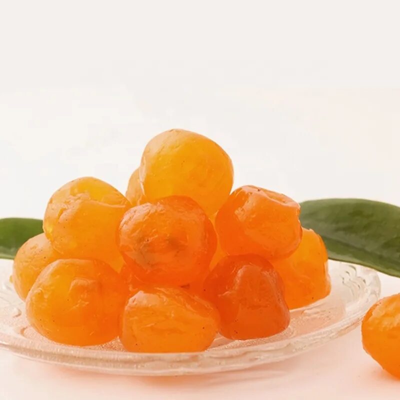 Фрукт цитрус кумкват. Кумкват это фрукт или ягода. Кумкват мандарин оранжевый. Фрукт цитрус кумкват. Кумкват что это за фрукт как есть.