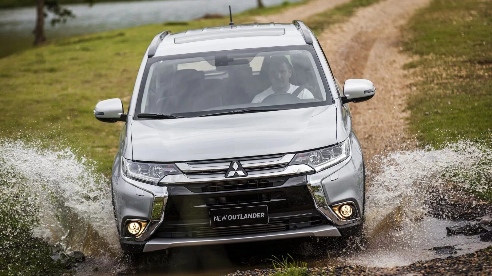 Mitsubishi Outlander 2015. Mitsubishi Outlander 3. Митсубиси Аутлендер 3 2015. Митсубиси Аутлендер 3.0. Мицубиси аутлендер обзор