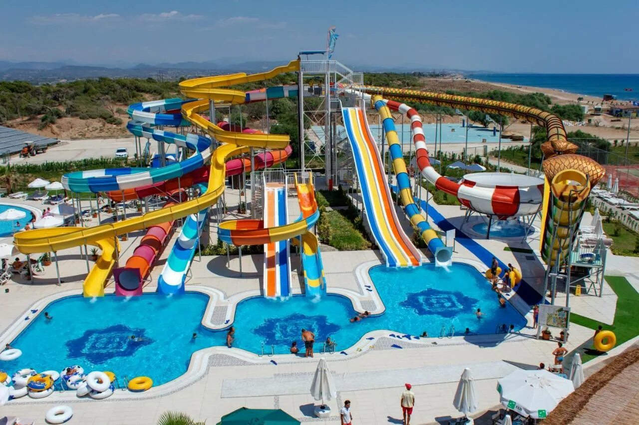 Queens park tekirova турция. Лонг бич аквапарк турция. Sueno hotels beach аквапарк. Новый отель с аквапарком. Сапфир египет хургада.