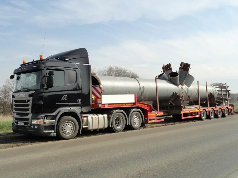 трал 30-60 тонн. белаз негабарит. низкорамный трал негабарит. перевозка длинномерных грузов. трал 20 метров.