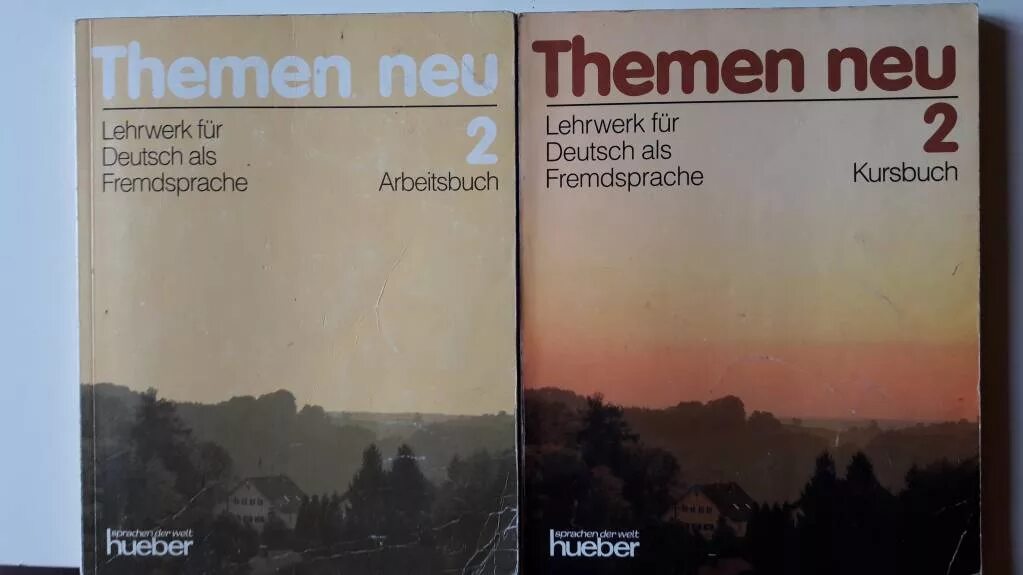 Schritte international тесты. Учебник schritte international a2. Em neu a2. Themen учебник. 1.