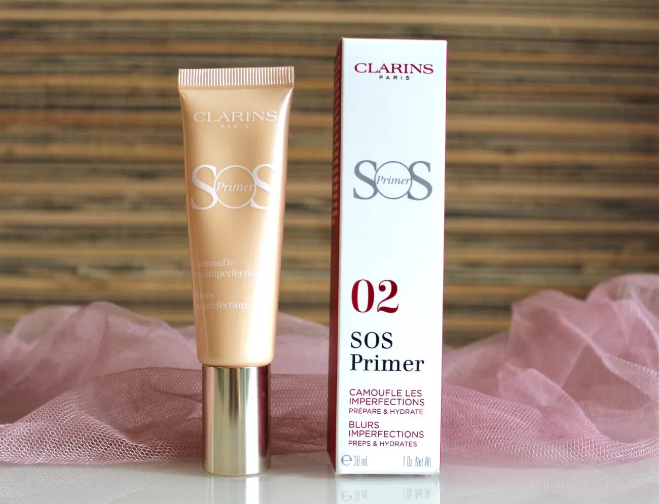 Clarins SOS праймер 02. Кларенс SOS праймер. Clarins база под макияж SOS primer. Clarins SOS тональный крем.