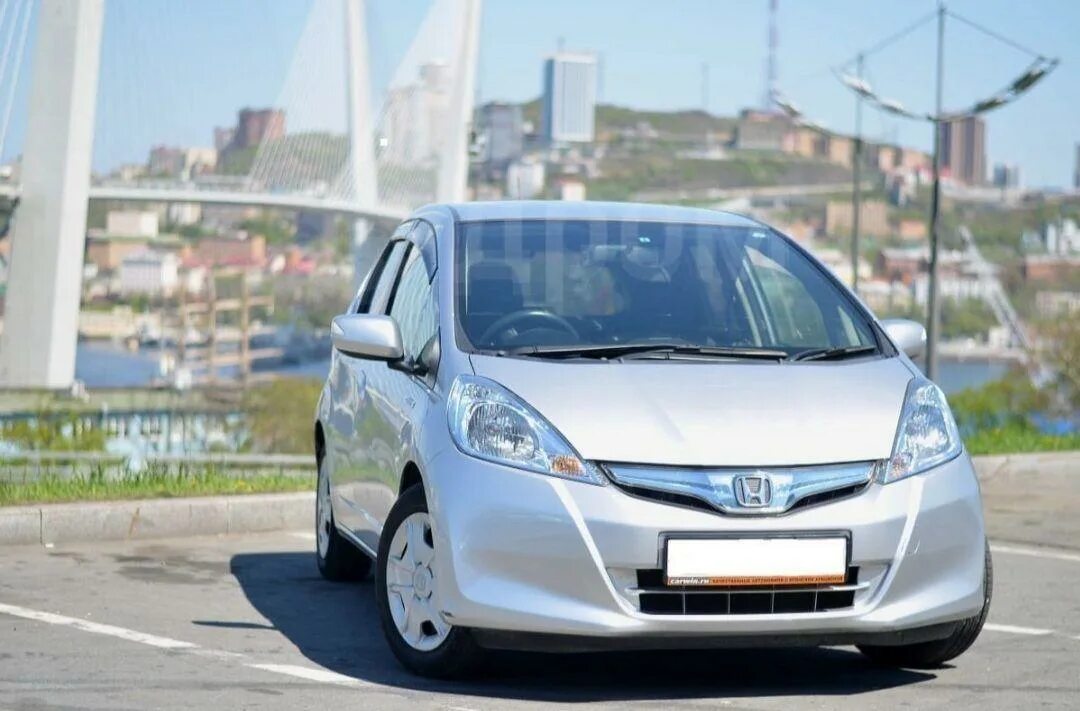 Honda Fit 2013. Хонда фит гибрид 2012. Хонда фит серая гибрид. Хонда фит 2013 белый правый руль.