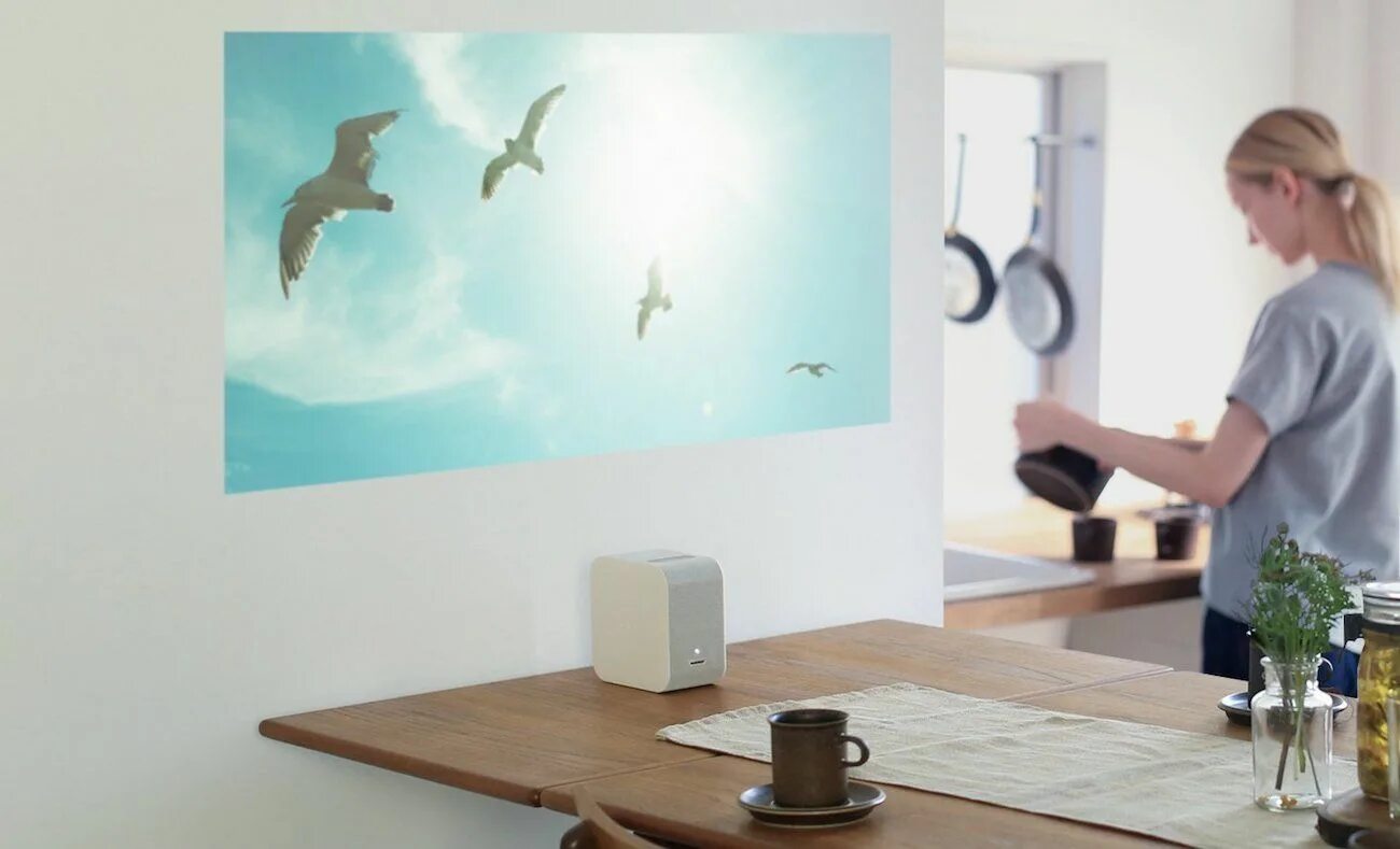 Обновить проектор. Sony ultrashort projector. проектор заяц. ultra short throw projector furniture. стена с доска для рисования в офисе под проектор.