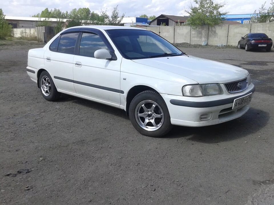 Ниссан санни 14 кузов. Nissan Sunny b15. Ниссан Санни b15. Ниссан Санни 98г белая. Ниссан Санни 98.