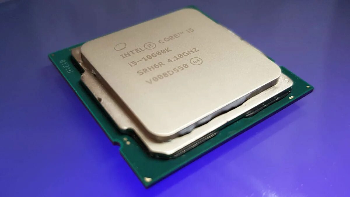 Модель процессора intel core. Core i5 10600k. Intel Core i9-10900k. Процессор Intel i9 10900k. Intel Core i5-1235u.