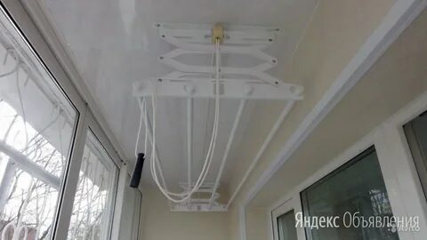 Монтаж сушилки для белья потолочной на балконе