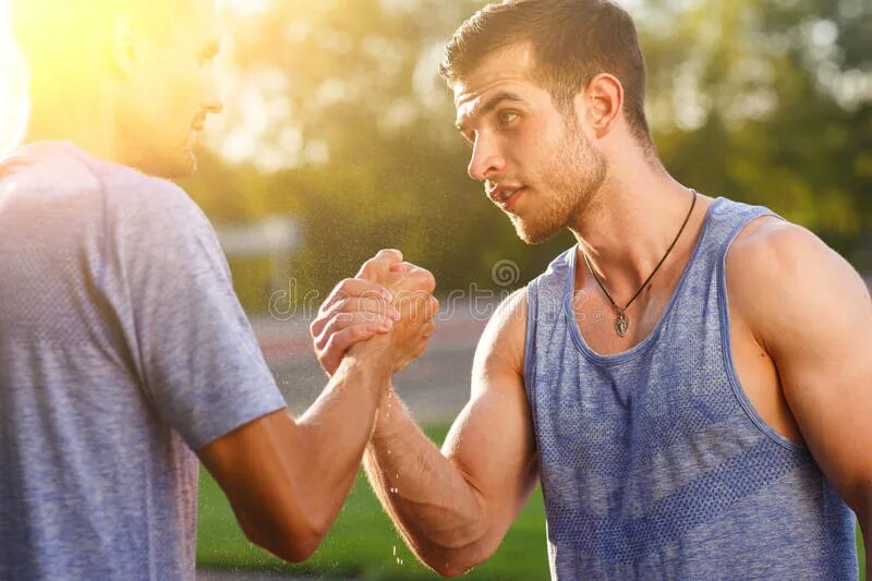 Two sportsmen. Sportsman Shaking hands.