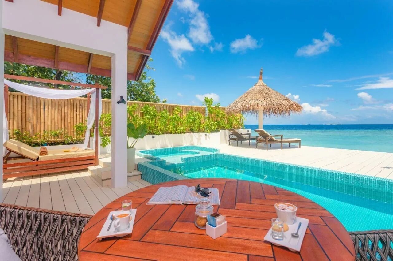 Отель малахини мальдивы. Malahini bandos resort мальдивы. Малахини бандос. Отель malahini kuda bandos 4. Bandos maldives beach villa.