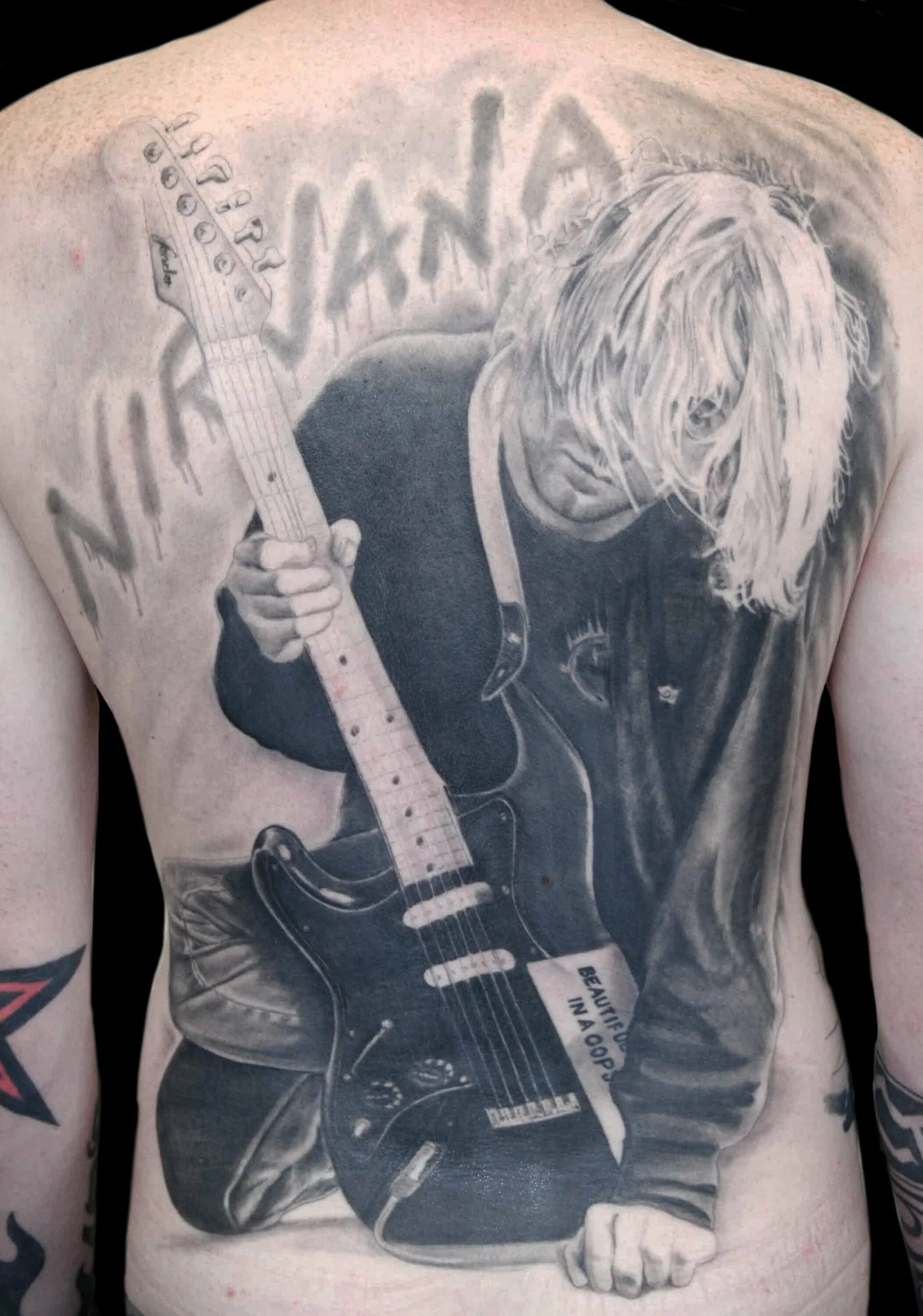 курт кобейн татуировки. курт кобейн тату. татуировка нирвана курт. курт кобейн тату. тату курта кобейна.