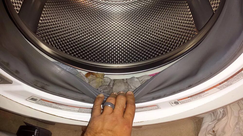 Стиральная машинка барабан АСКО. Пропадают носки в стиралке. Стиральная машинка ест носки. Носок в стиральной машине.