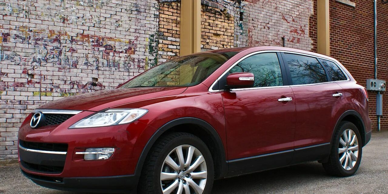 Купить б/у Mazda CX-9 I 3.7 AT (277 л.с.) 4WD бензин автомат в Москве: пурпурный