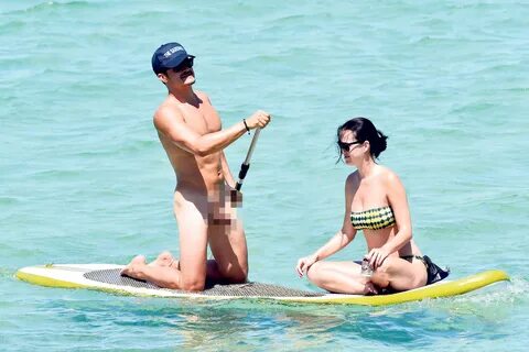 Orlando bloom paddle boarding naked