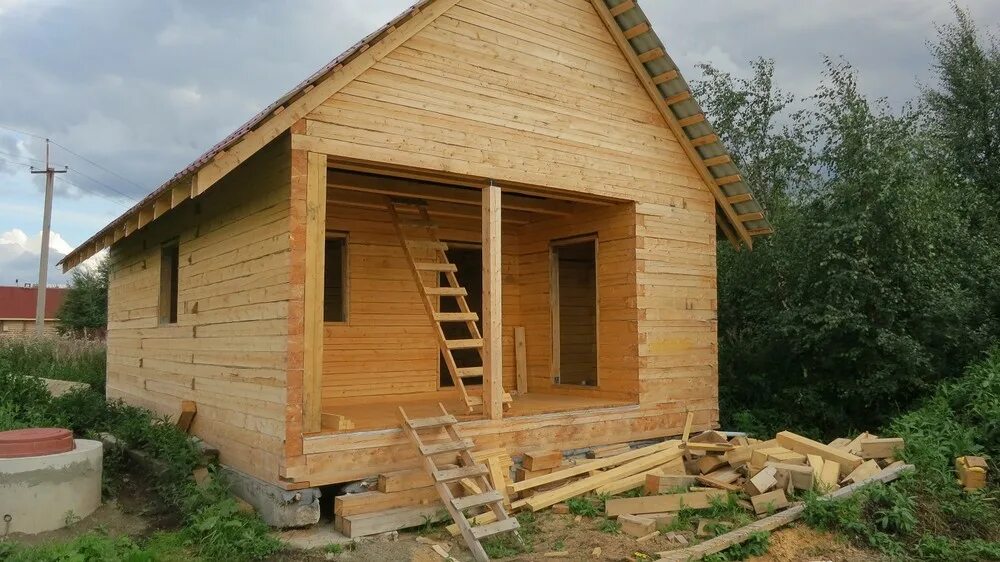 дом из бруса естественной влажности. профильный брус. полуторноэтажный дом из сушеного пропилируемого бруса. стена из бруса. дом из бруса естественной влажности.