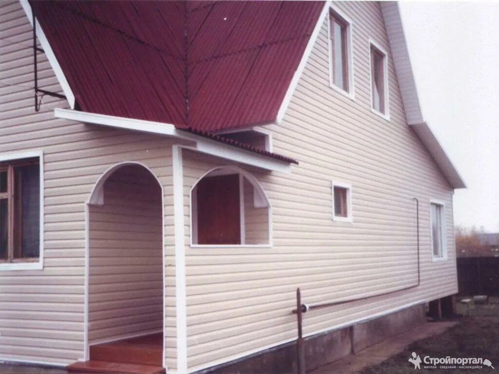 Обшивка сайдингом минск. Дом обшитый металлосайдингом. Снт 64. Сайдинг docke елочка. Сайдинг дачный дом.