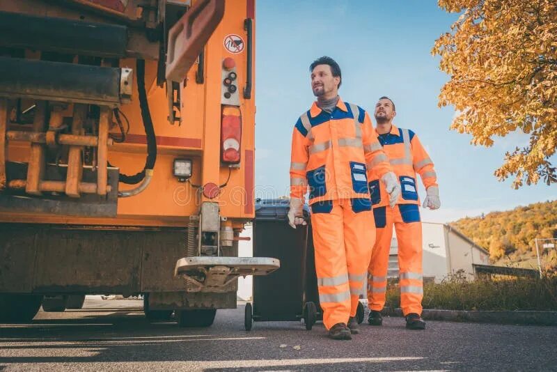 Workers load. Garbage collection workers. Load worker. Loaders at work. Dustman/refuse Collector.