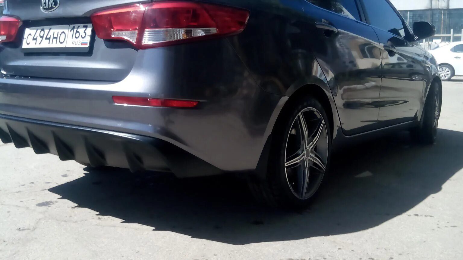 Диффузор рио 3. Kia rio 3 диффузор заднего бампера. диффузор киа рио 3. задний диффузор киа рио 3. диффузор на задний бампер киа рио 3 седан.