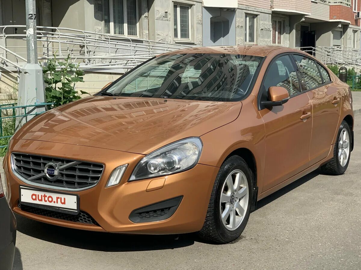 Вольво s60 2012 года. Volvo s60 Orange. Volvo s60 2012. Вольво s60 2012. Вольво s60 оранжевая.