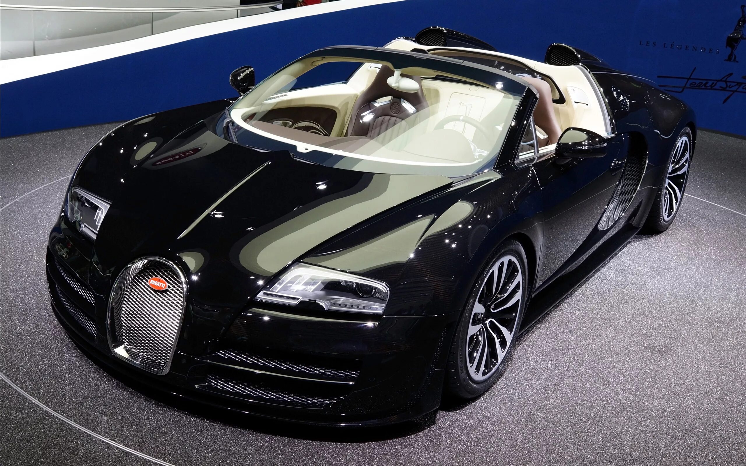 Bugatti производитель. Bugatti Вейрон. Bugatti 2009 Veyron centenaire. Bugatti Veyron Grand Sport Vitesse. Бугатти 2013.