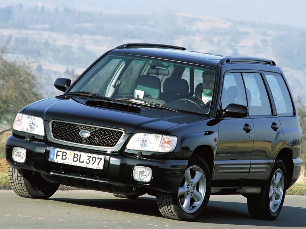 Субару форестер какие поколения. Subaru Forester 2000. Субару Форестер 1997. Субару Форестер 1 поколения. Subaru Forester 1997.