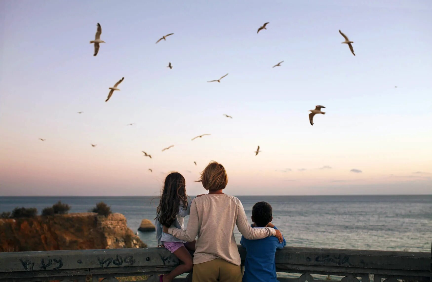 Fly holidays. Looking at the Sky. Girl and boy looking at the Sky. A boy looking at the Sky. Children looking at the Sky.