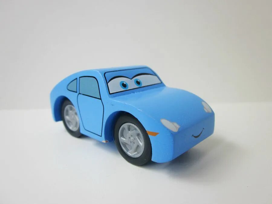 Cars 3 sally. Салли Каррера игрушка. Салли Каррера Тачки игрушки. Салли модель машины. Cars 1 Sally Carrera Pink.