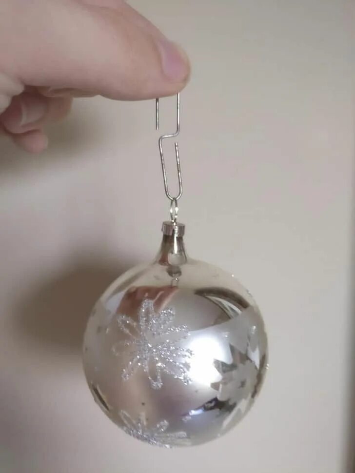 Use clips to hang your Christmas ornaments on the tree if you do not find hooks