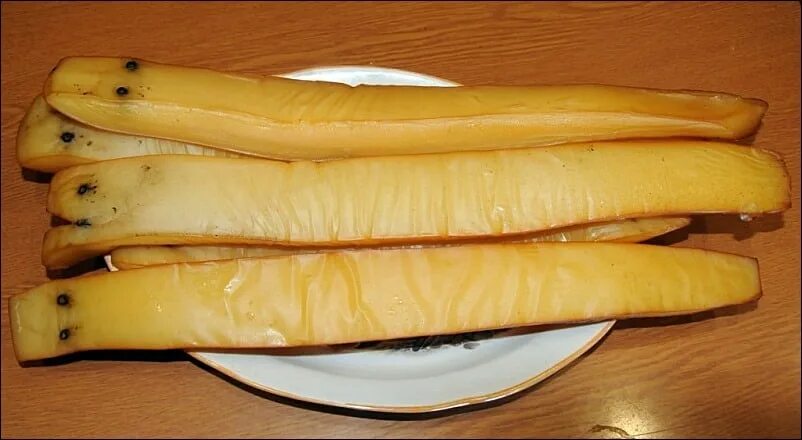 Кальмар гигантский холодного копчения. Кальмар гигантский холодного копчения. Кальмар гигантский холодного копчения. Кальмар холодного копчения. Кальмар косичка холодного копчения.