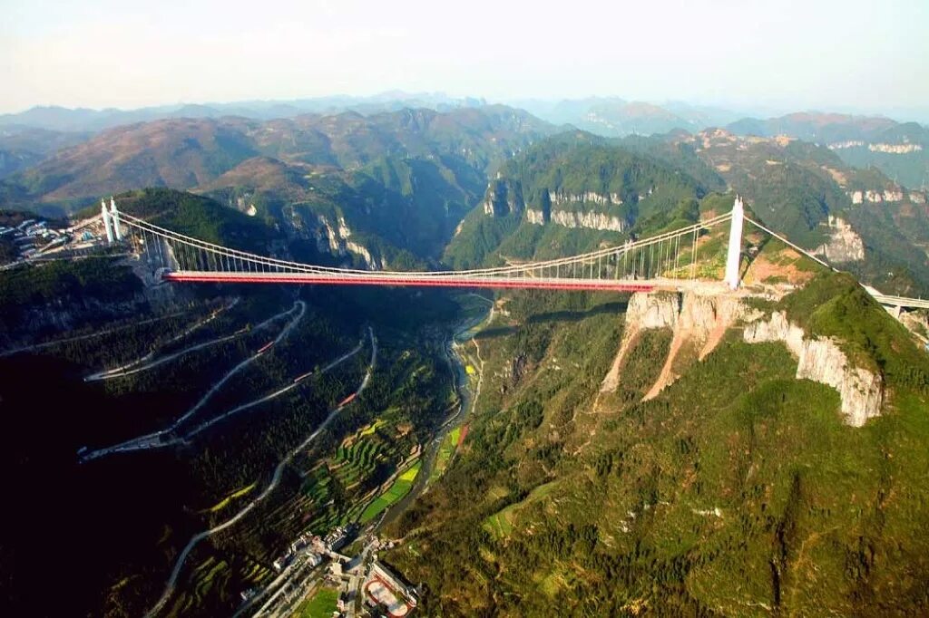 Мост айчжай Китай. Айчжай Китай подвесной. Подвесной мост айчжай. Магистраль Чунцин-Хунань. Название самого длинного моста