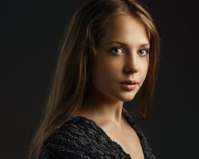 Как она еще