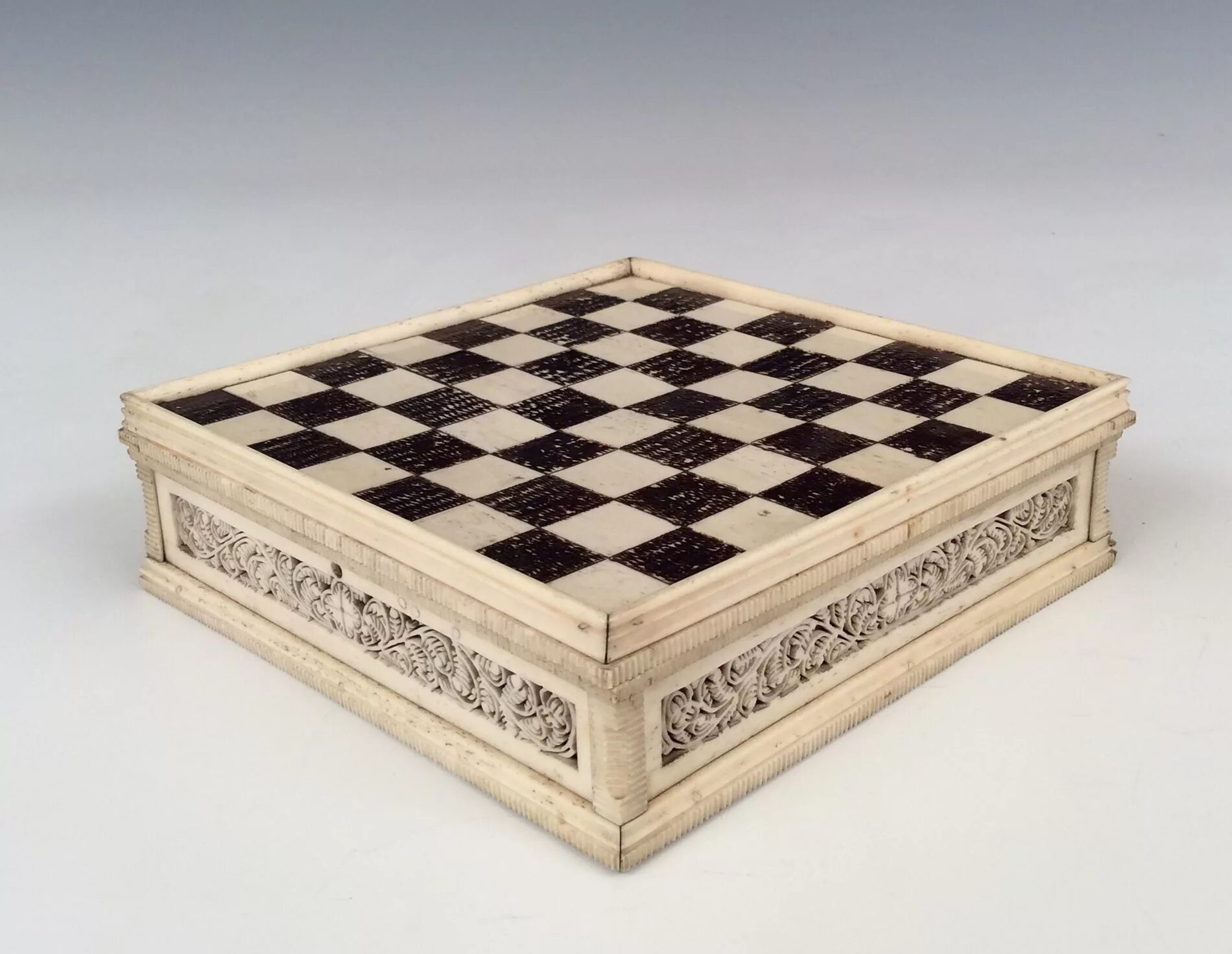 He this chessboard in an antiques shop