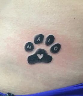 Dog paw print tattoo made by Kris Smith. 