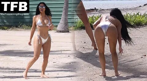 Kim Kardashian on Beach Bikini (18 Photos) .