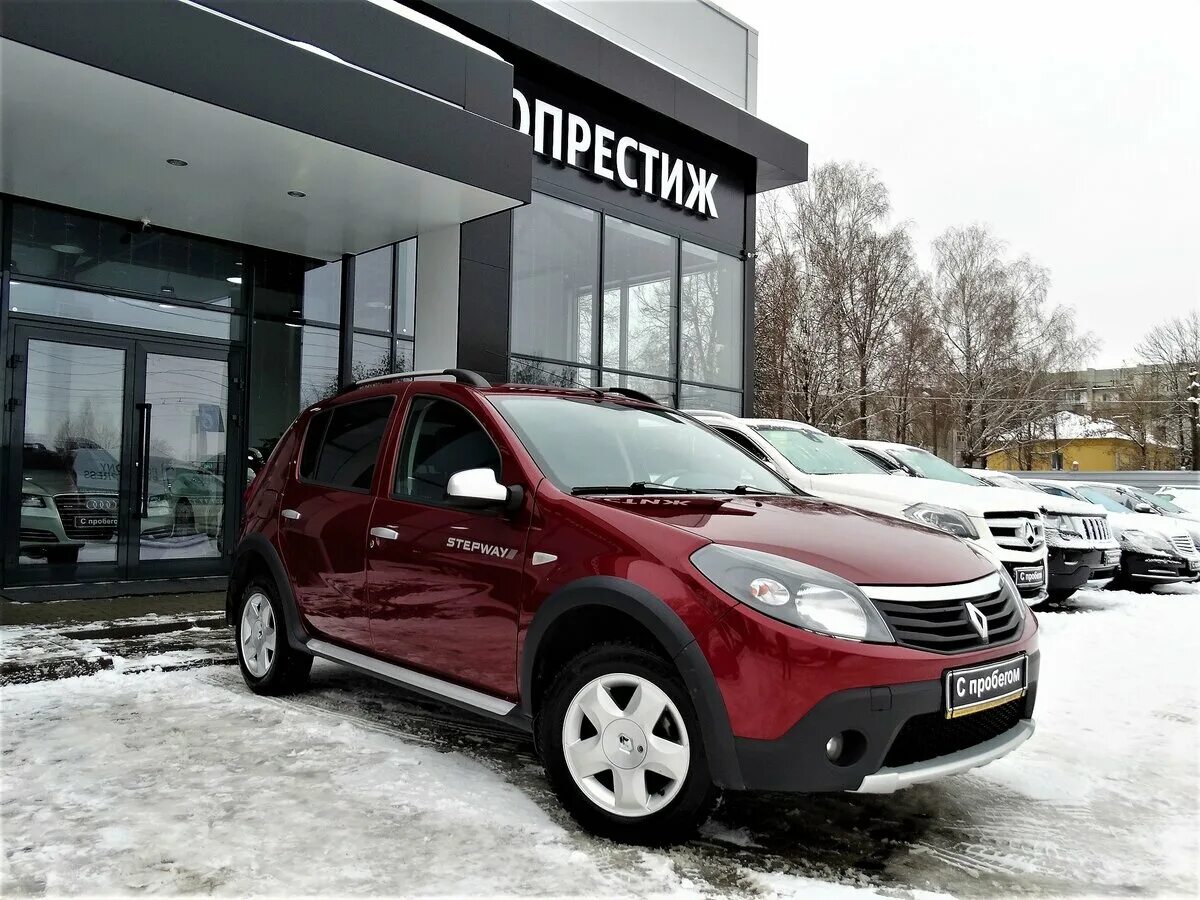 Рено Сандеро степвей 2014 красный. Sandero II 2014. Renault Sandero Stepway 2014. Рено Сандеро 2014 красный.