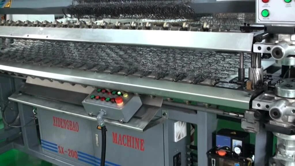 Через станок. Sx-200 боннель. станок bm 200. станок для производства пружинных блоков для матрасов. станок для производства пружин.