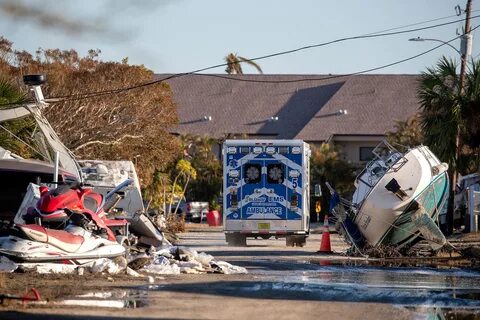 An ambulance passes through the bay mobile park in San Carlos Island after ...