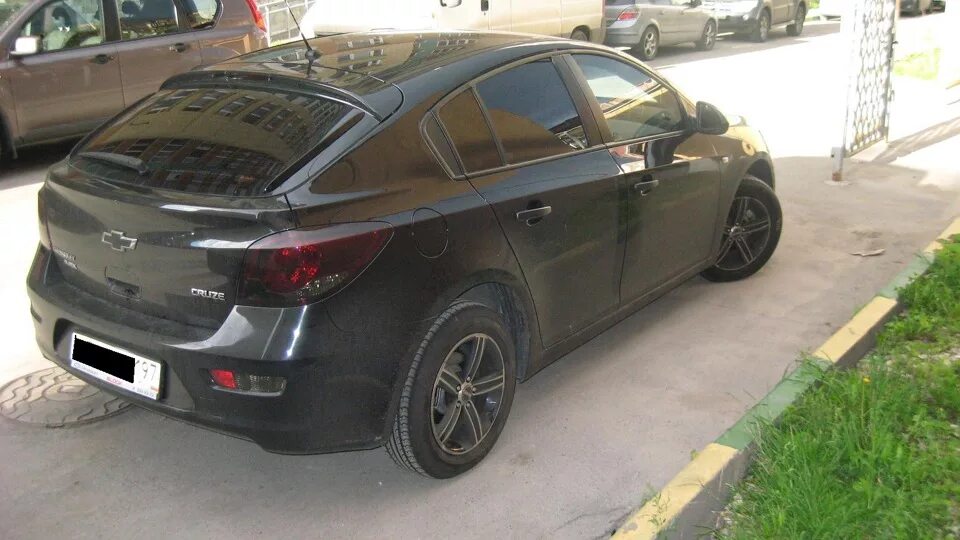 Chevrolet cruze черный тонированный. Черный шевроле круз в тонировке. Шевроле круз тонированный 2013. Шевроле тонированная. Chevrolet cruze 1 тонированная.