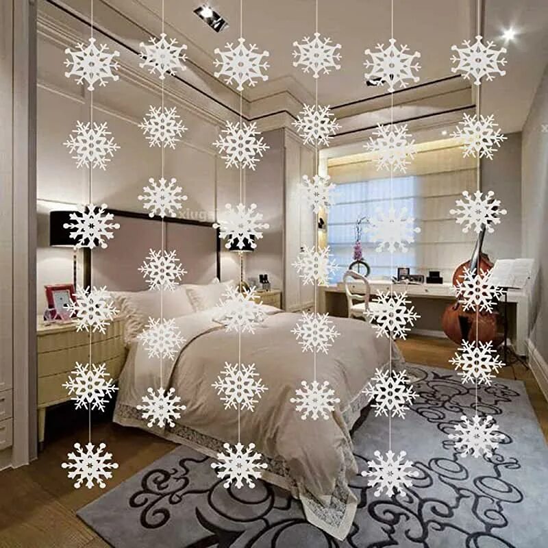 Give your frosted tree a splash of color with red, silver and burgundy ornaments