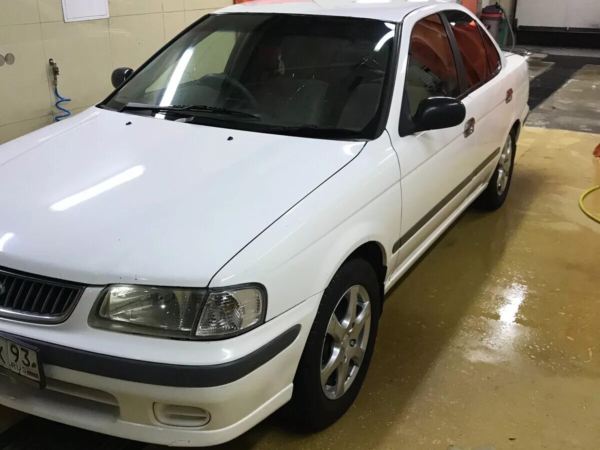 Ниссан санни край. Ниссан Санни 2000 b15. Ниссан Санни б15 белый. Nissan Sunny b15. Ниссан Санни b15.