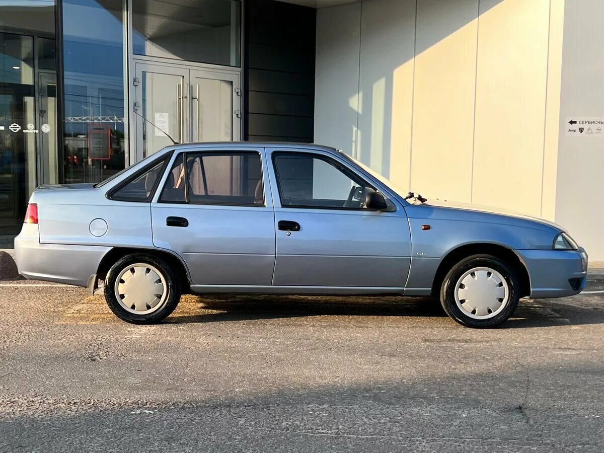 Нексия 1 сколько. Серый daewoo. нексия 1 с боку.