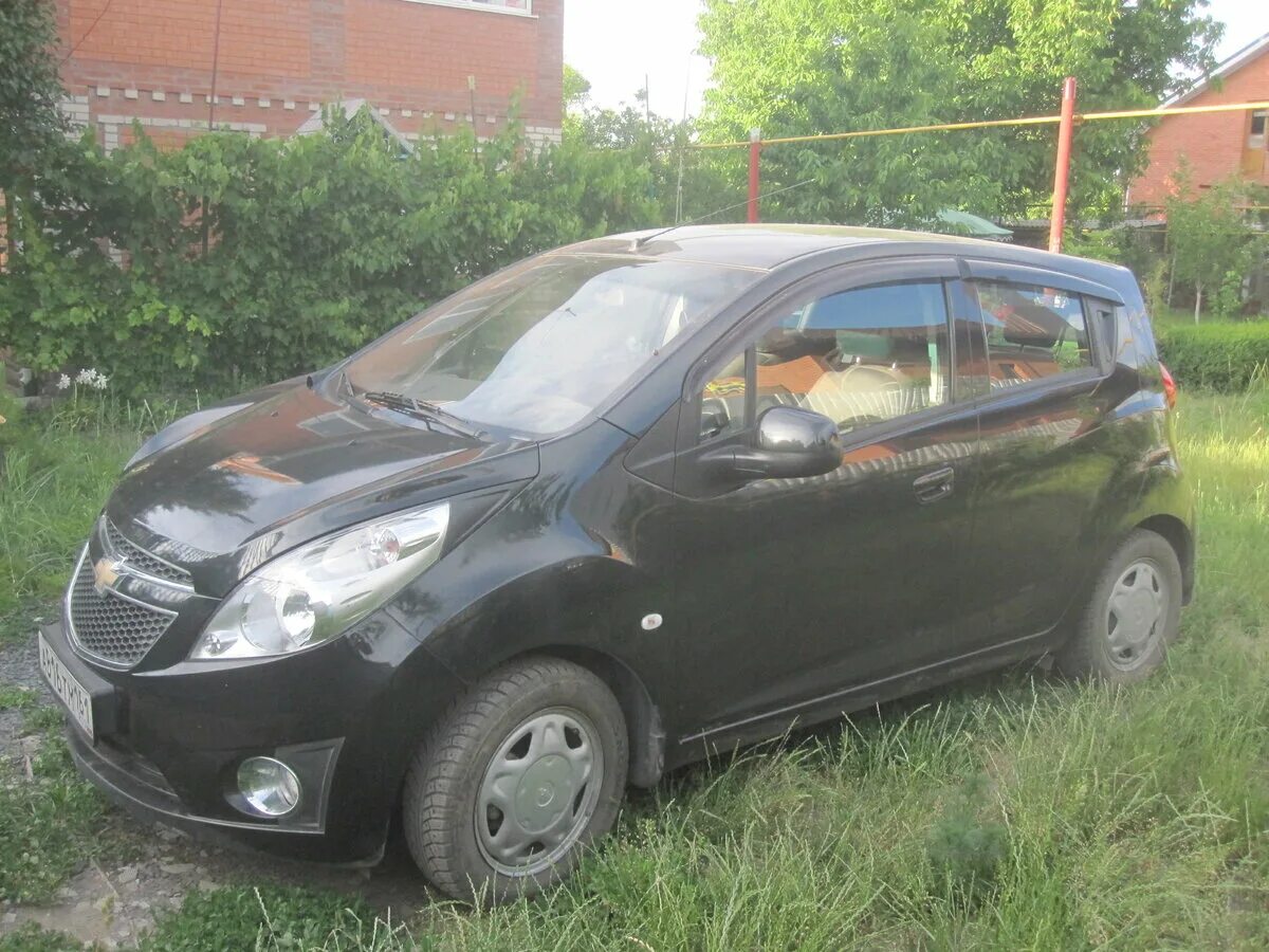 Спарк номер телефона. Chevrolet Spark 2012 Black. Chevrolet Spark черный. Шевроле Спарк 3 черная. Шевроле Спарк 2012 черный цвет.