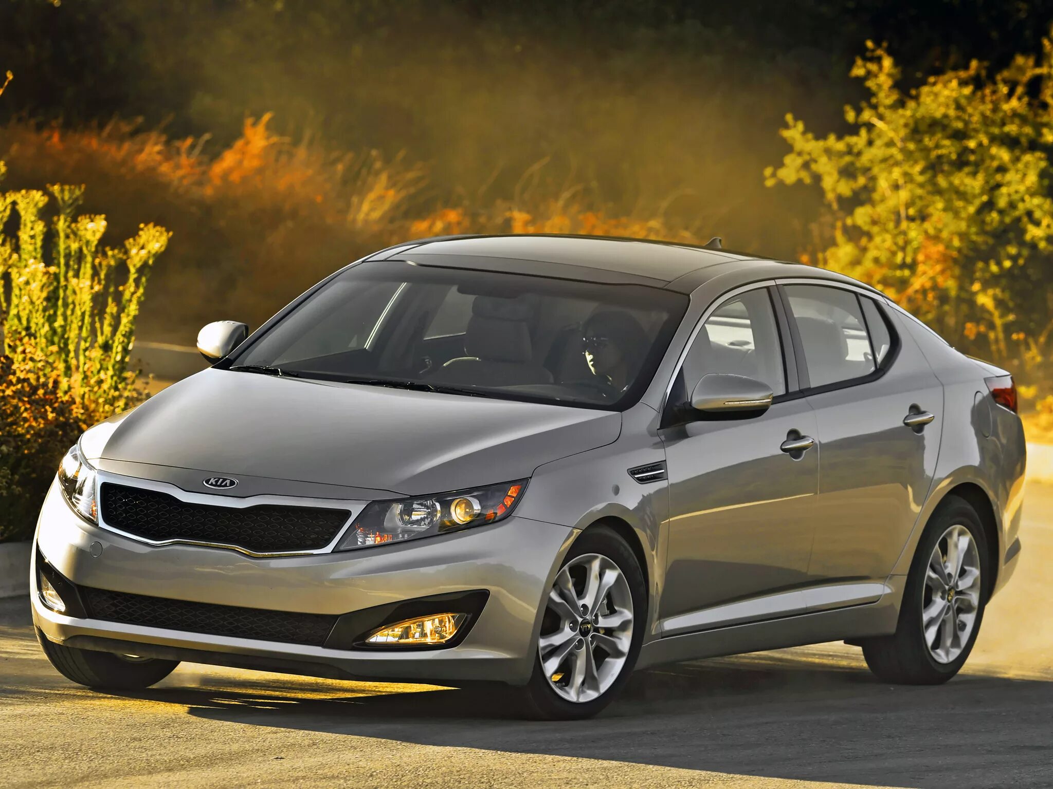 Кия фото. Kia Optima 2010. Kia Optima III 2010. Киа седан Оптима 2013г. Kia Magentis / Optima 2013.