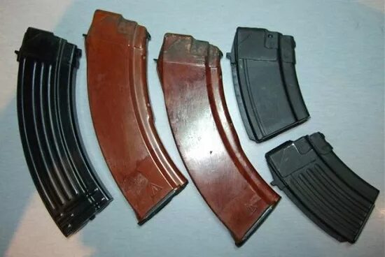 Двухрядный магазин ак. Какая емкость патронов магазина ак 74. Акм 7. Пулемёт пкм 7. Пулемёт пкм 7.