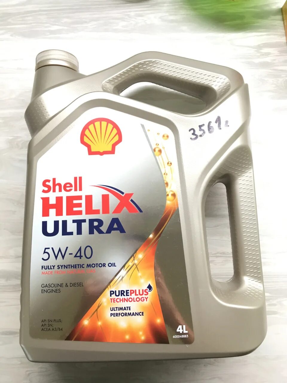 Масло шелл ультра. Шелл хеликс ультра 5w40. shell helix ultra 5w40 acea a3/b4 api sn plus. shell helix ultra 5w40 крышка. шелл хеликс ультра 5w40 api sn.