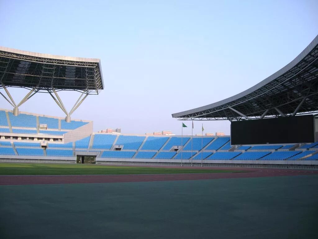 Hefei Olympic Sports Center Stadium. Huangpu Sports Center Stadium. Shaanxi Sports Center Stadium. Стадион олимпийского спорткомплекса города Циньхуандао.